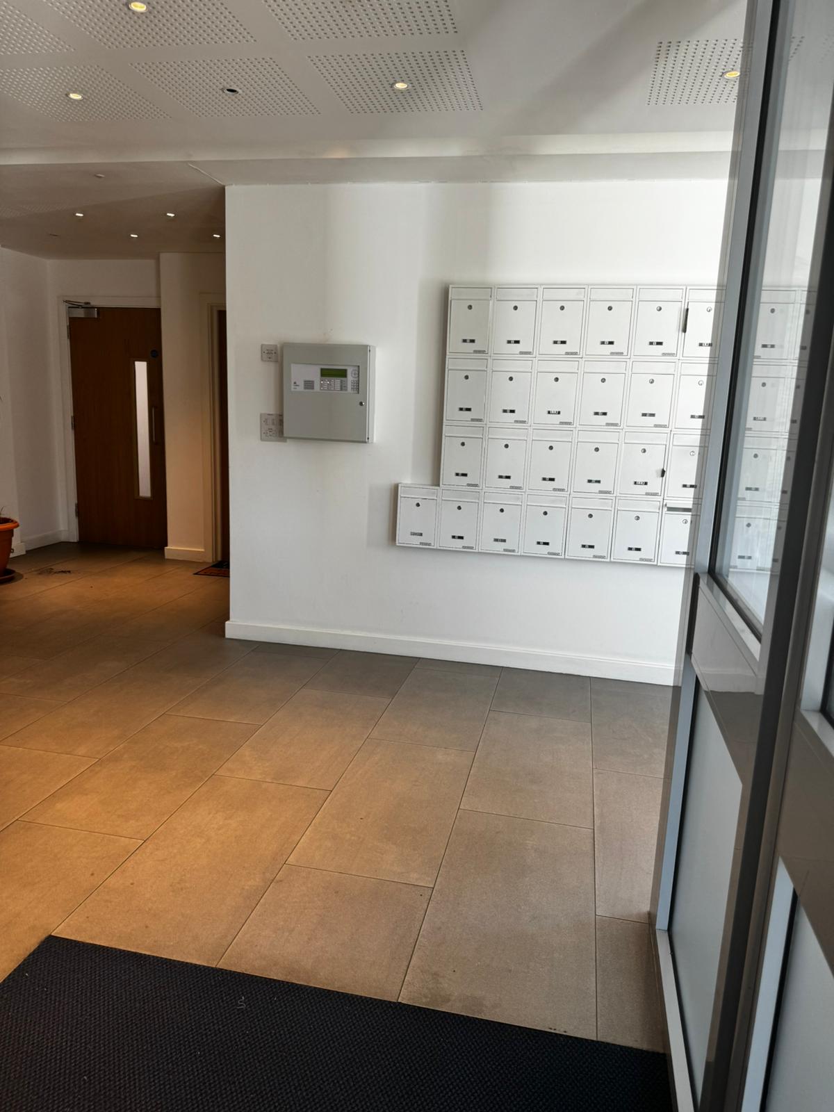 Communal entrance cleaned by L E Cleaning in London