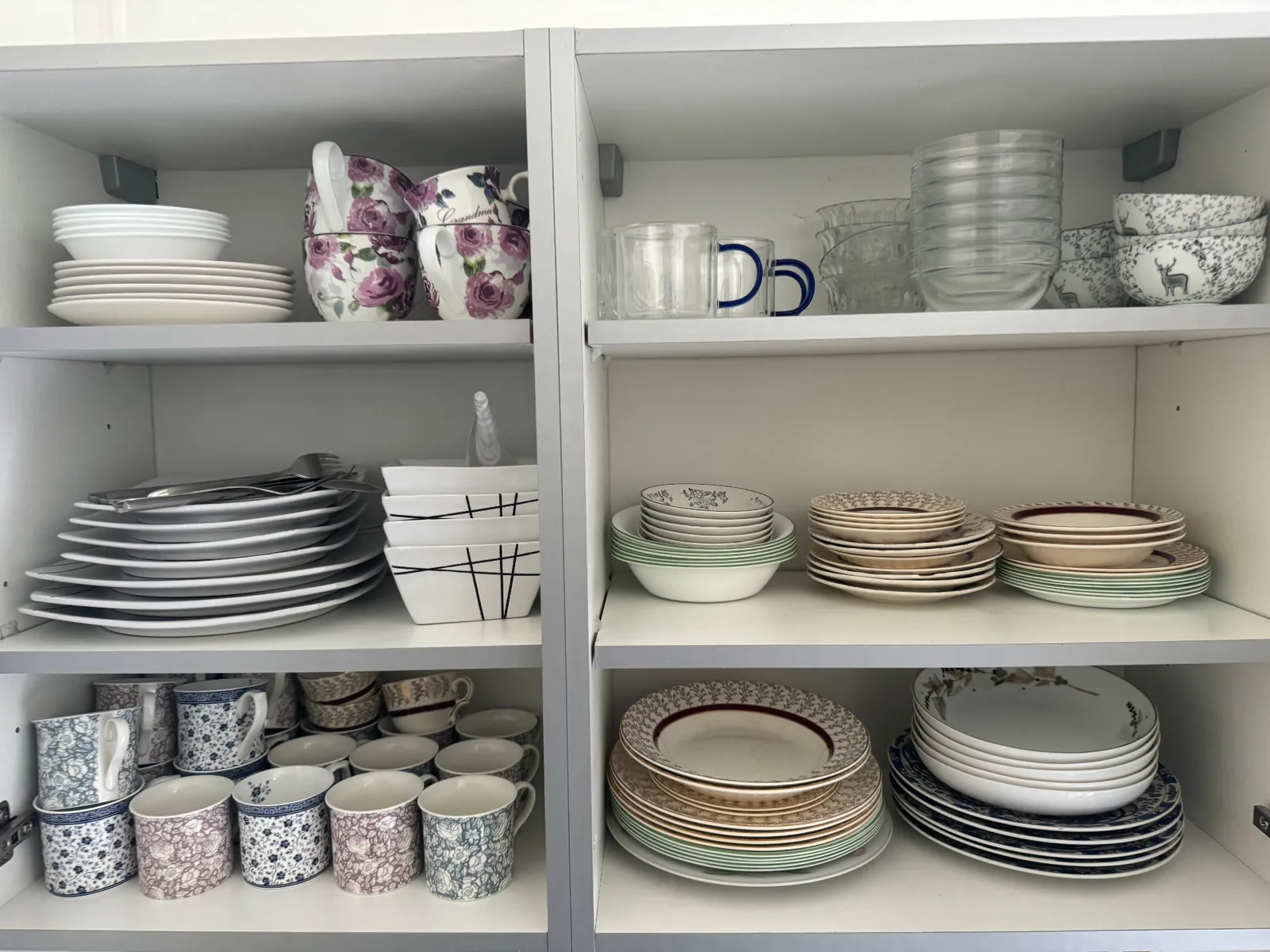 Cupboards emptied, wiped & restacked